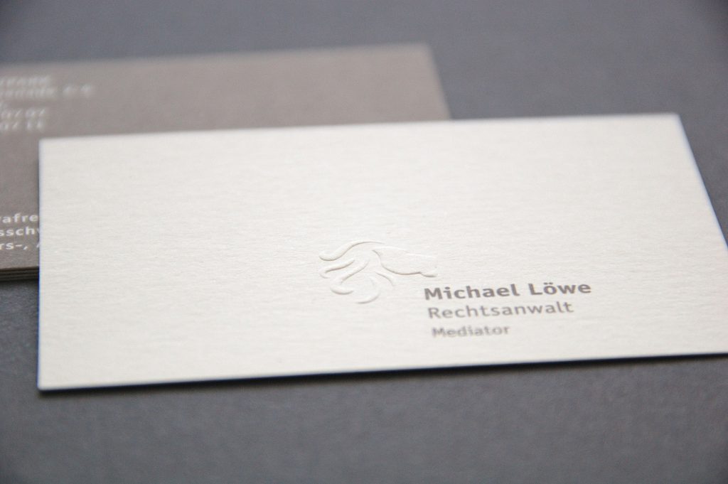 business card Löwe blind embossing close up